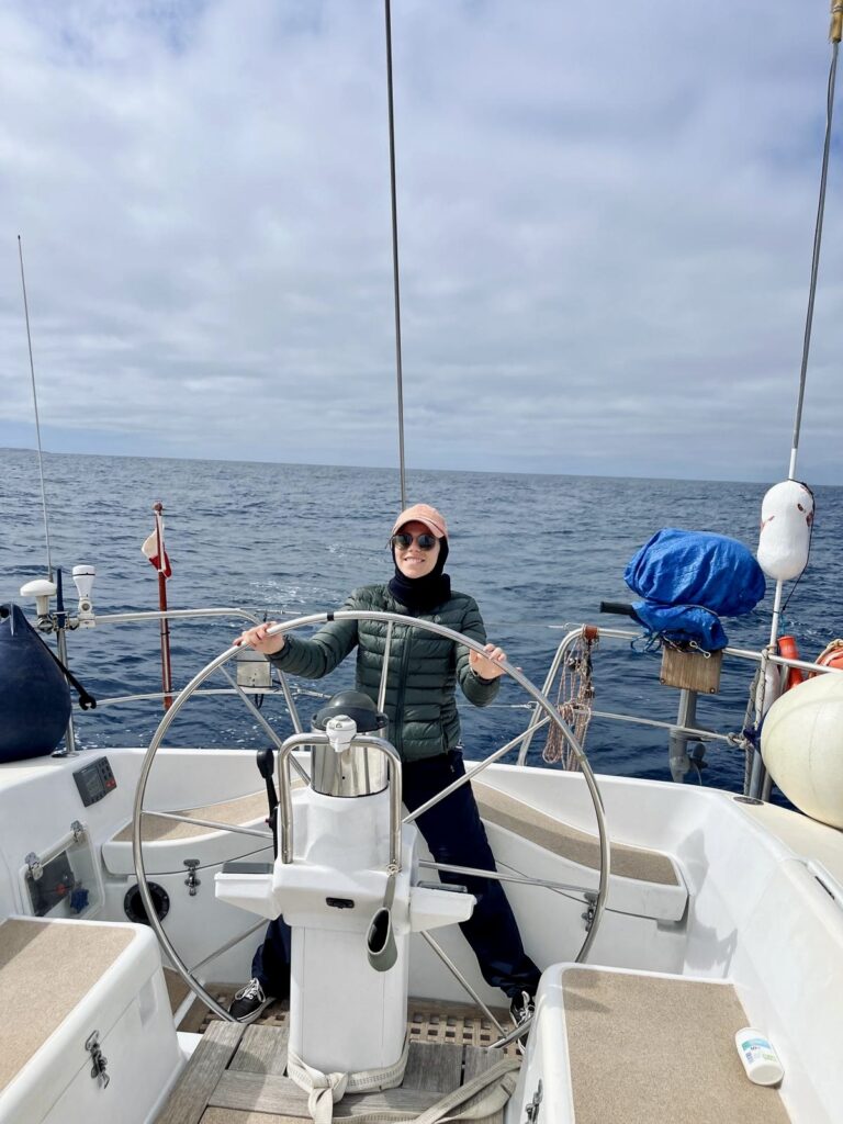 Erica driving the boat