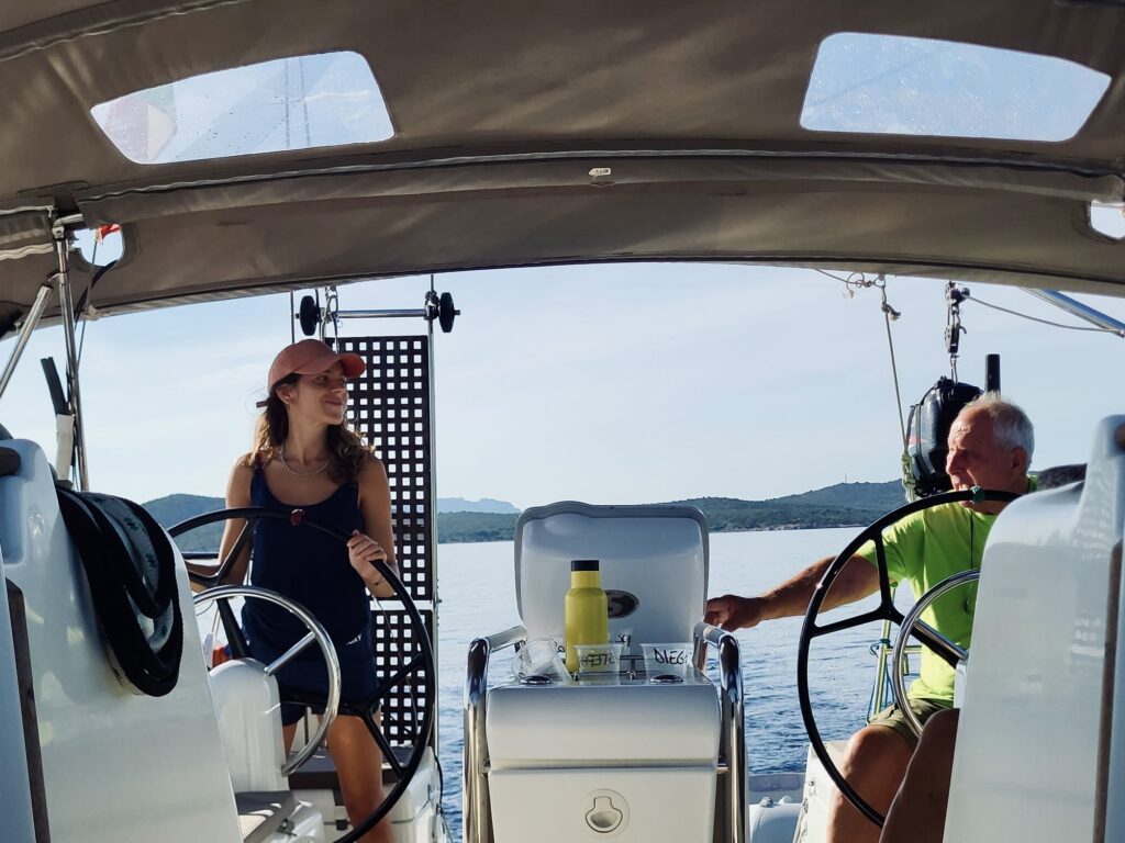 Erica driving and Skipper