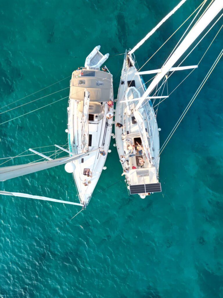 Two sailing boats, drone shot from above