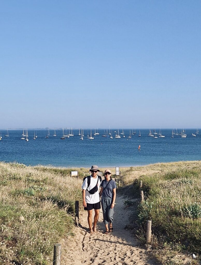Erica & Stefan in Brittany, sailing boats in the background