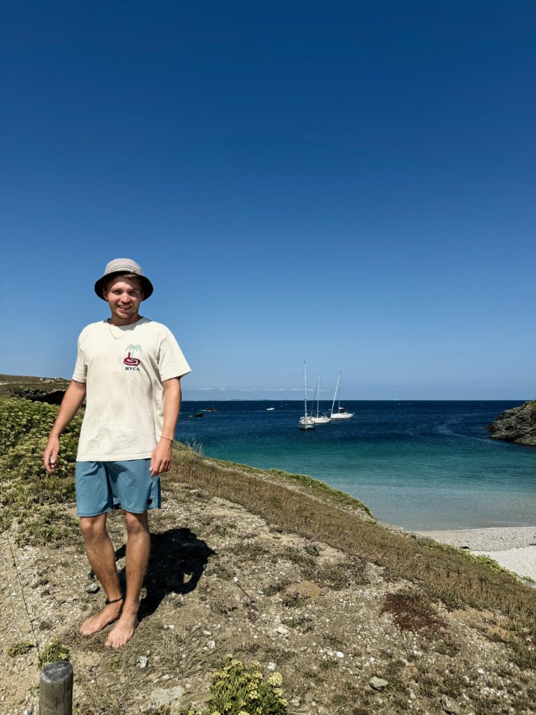 Stefan in Brittany, cristal clear water in the background