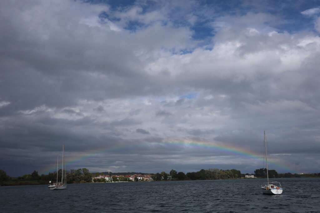 Rainbow sailboats Stormy Weather in Greece