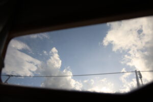 boat window clouds
