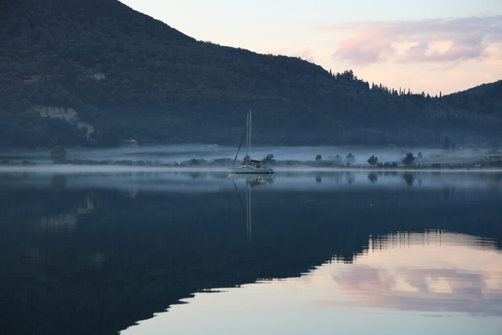 Sailing Boat Sunrise Fog in Winter, Vliho Bay, Greece